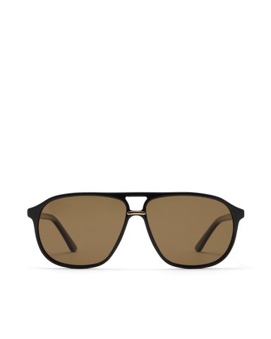 Oversized women's aviator sunglasses with a, flat-top brow bar, keyhole cut, double bridge, and slim arms.