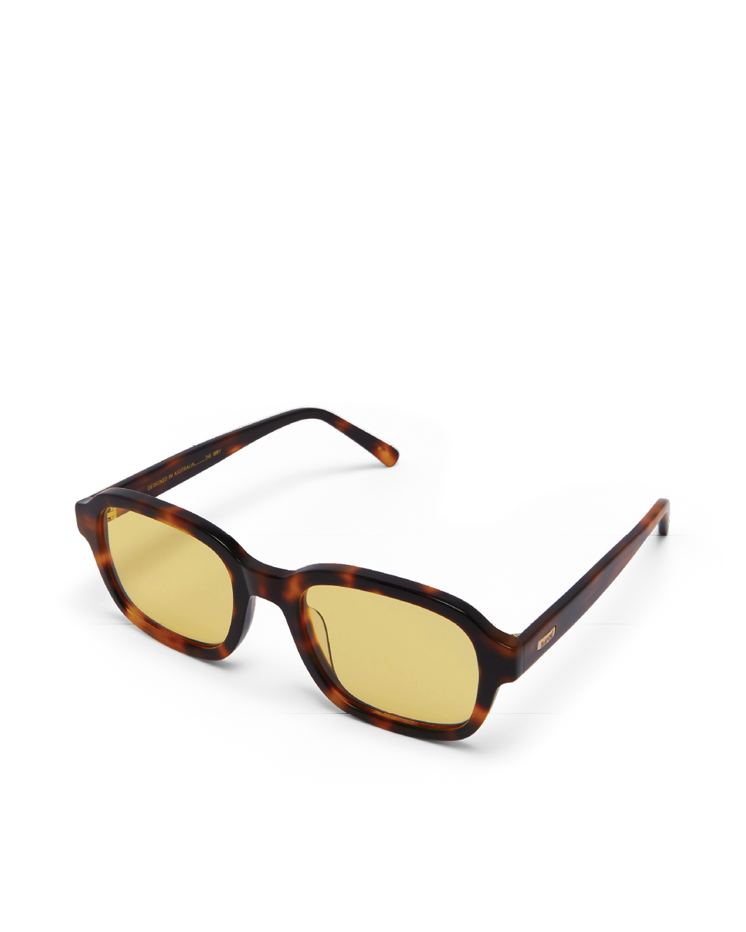 Sunglasses with tortoiseshell frame and yellow lenses on a white background