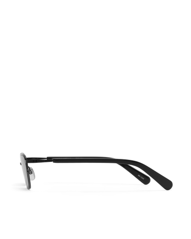Women’s metal cat-eye sunglasses with UV protection, thin frame, dark tinted lenses, side view