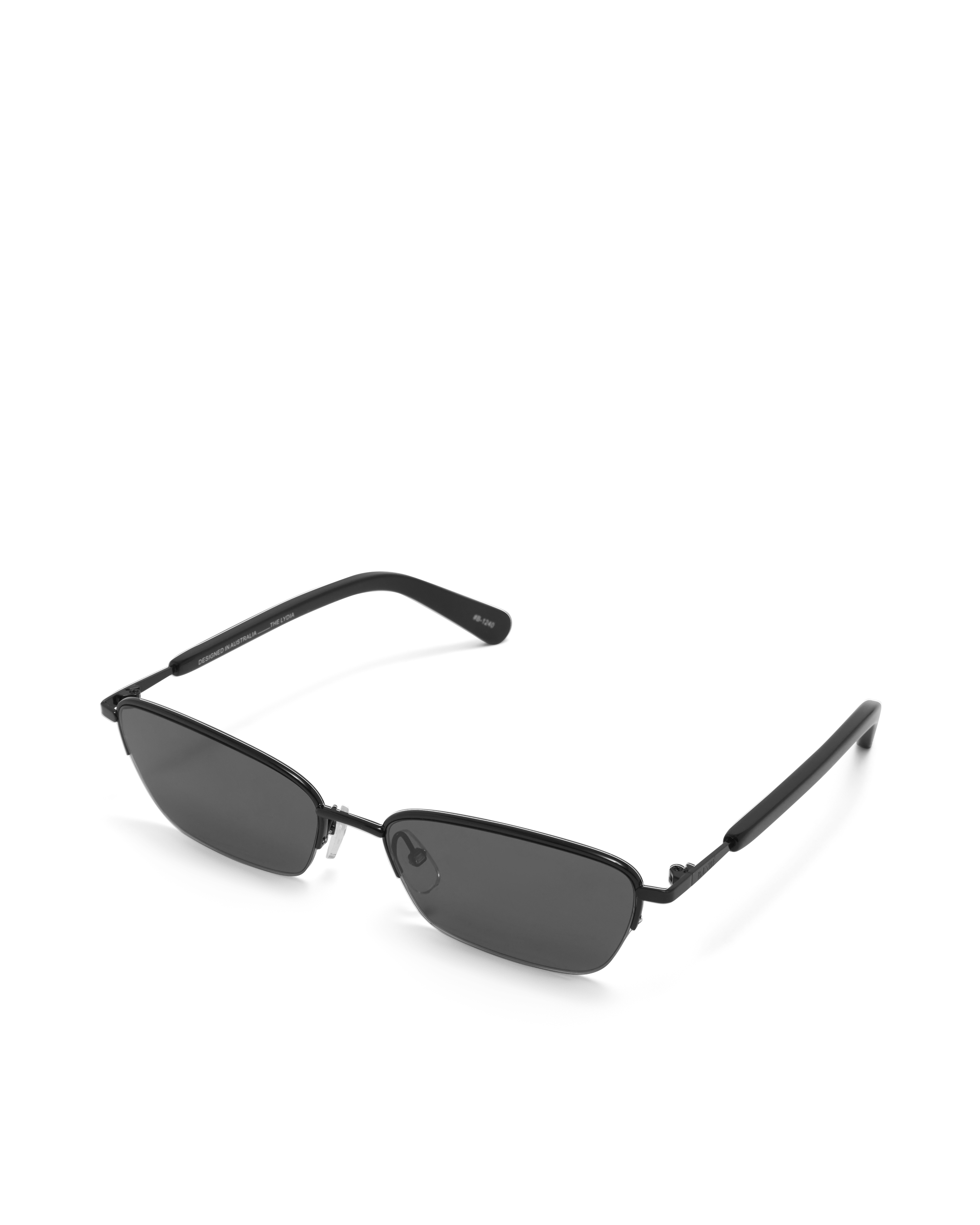Women’s metal cat-eye sunglasses with UV protection, thin frame, dark tinted lenses, side view